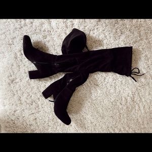 Thigh-high black boots